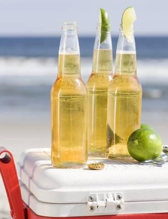 Beer and cooler on beach